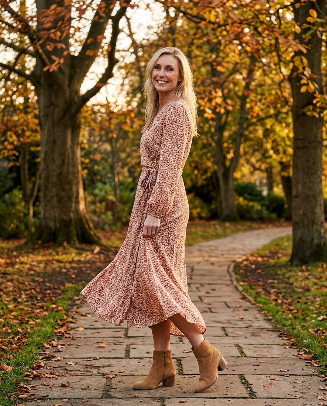 Ellie in a floral midi wrap dress in Valley Gardens