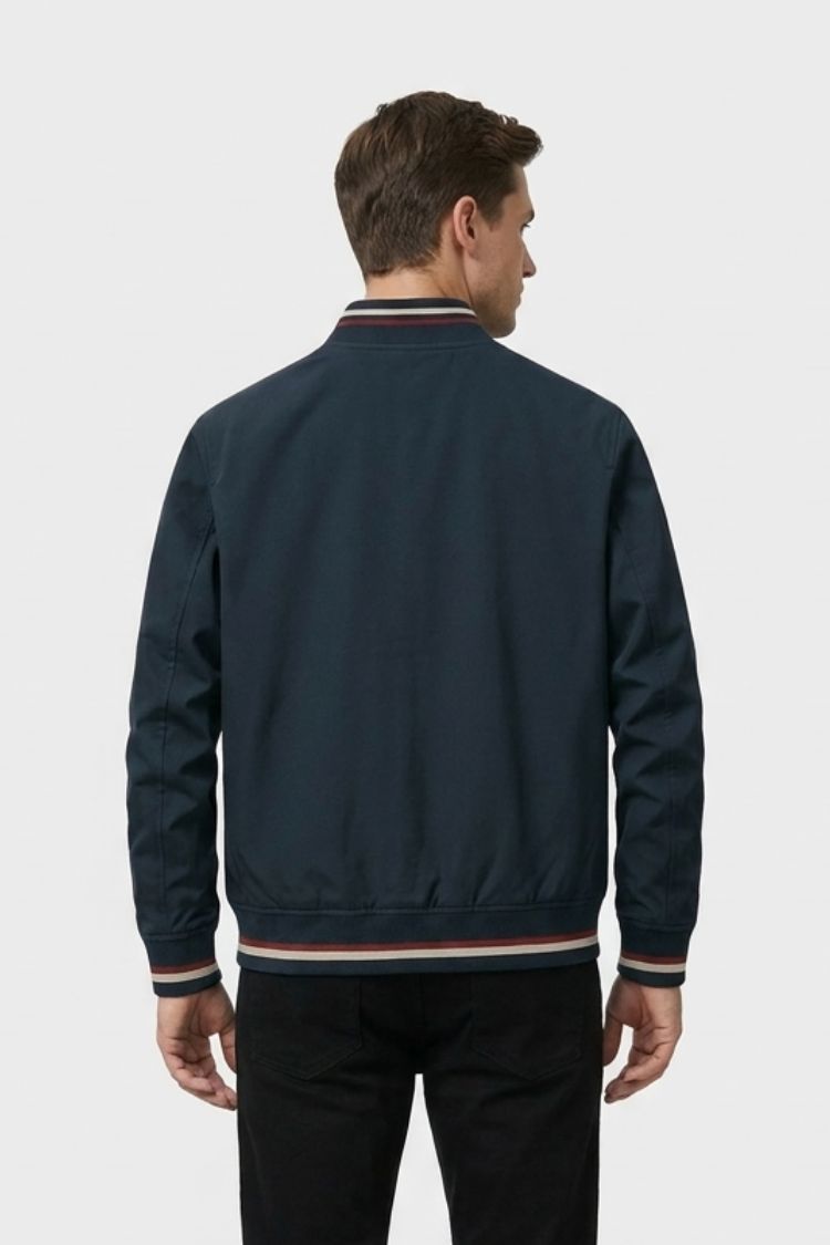 Back view of the navy bomber with striped rib hem