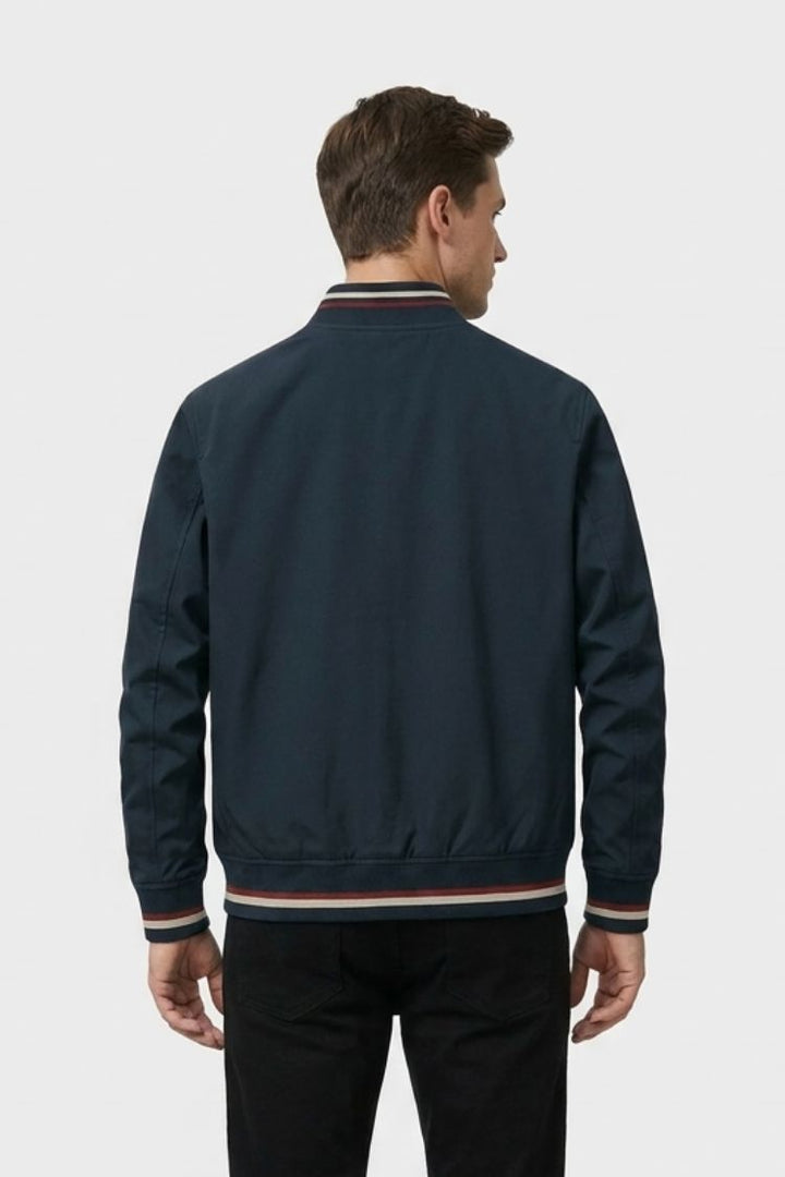 Back view of the navy bomber with striped rib hem