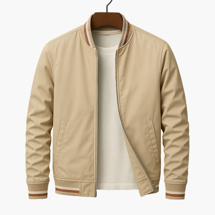 Khaki bomber jacket on a hanger with striped collar and cuffs