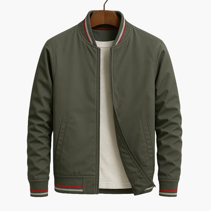 Sage Green bomber jacket on a hanger with striped collar and cuffs