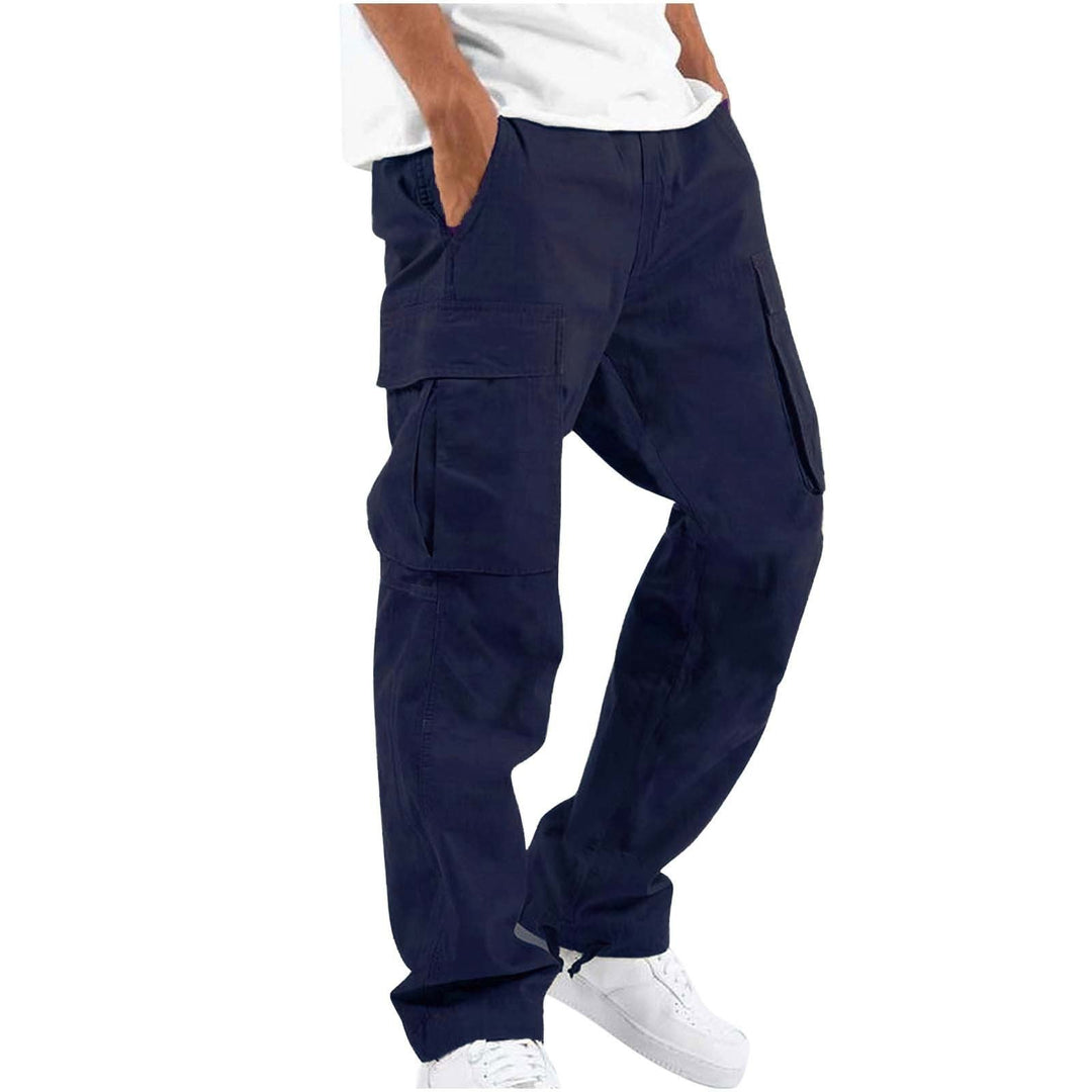 Navy cargo trousers worn with a white tee and trainers