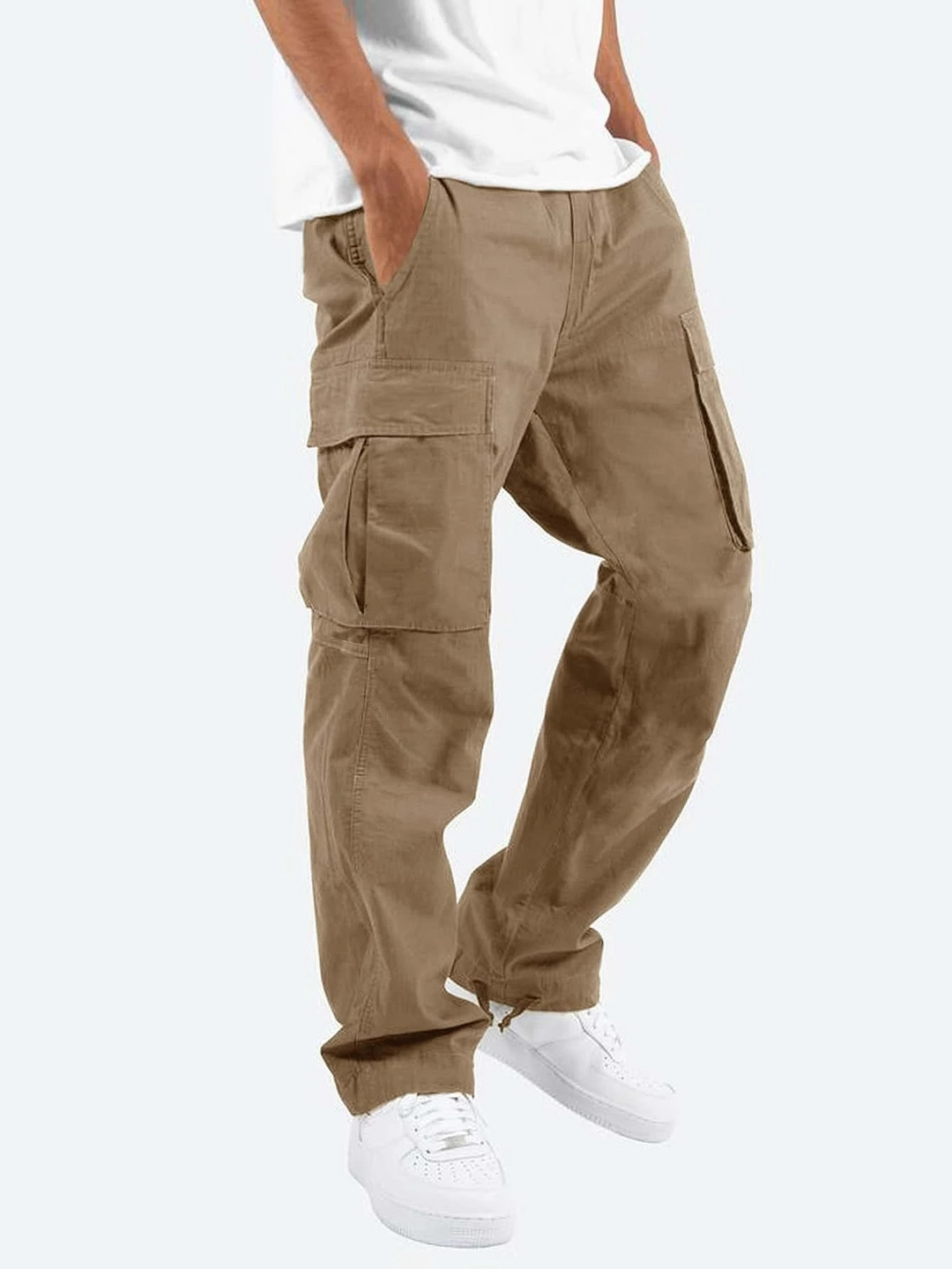 Tan cargo trousers worn with a white tee and trainers