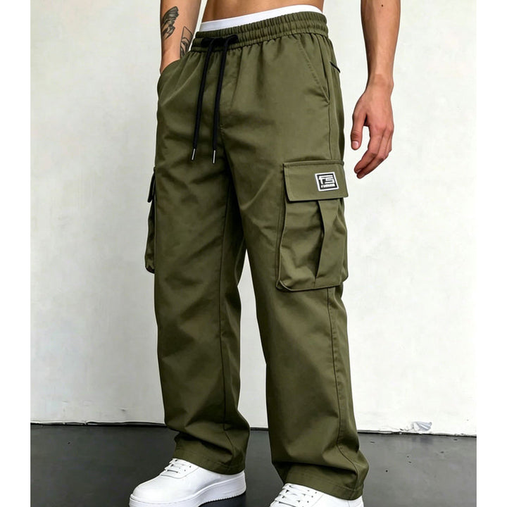 Army Green wide leg cargo trousers worn with white trainers