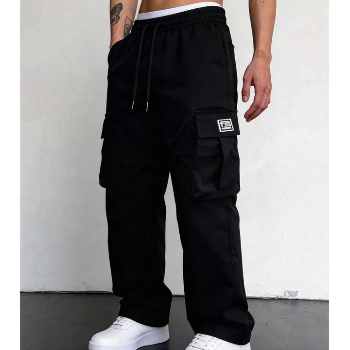 Men's wide leg cargo trousers in black, elastic drawstring waist and flap pocket
