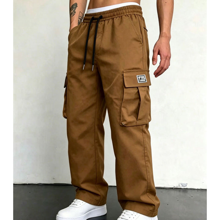 Caramel wide leg cargo trousers worn with white trainers
