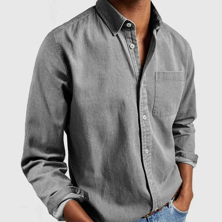 Grey casual shirt with point collar and chest pocket, worn untucked