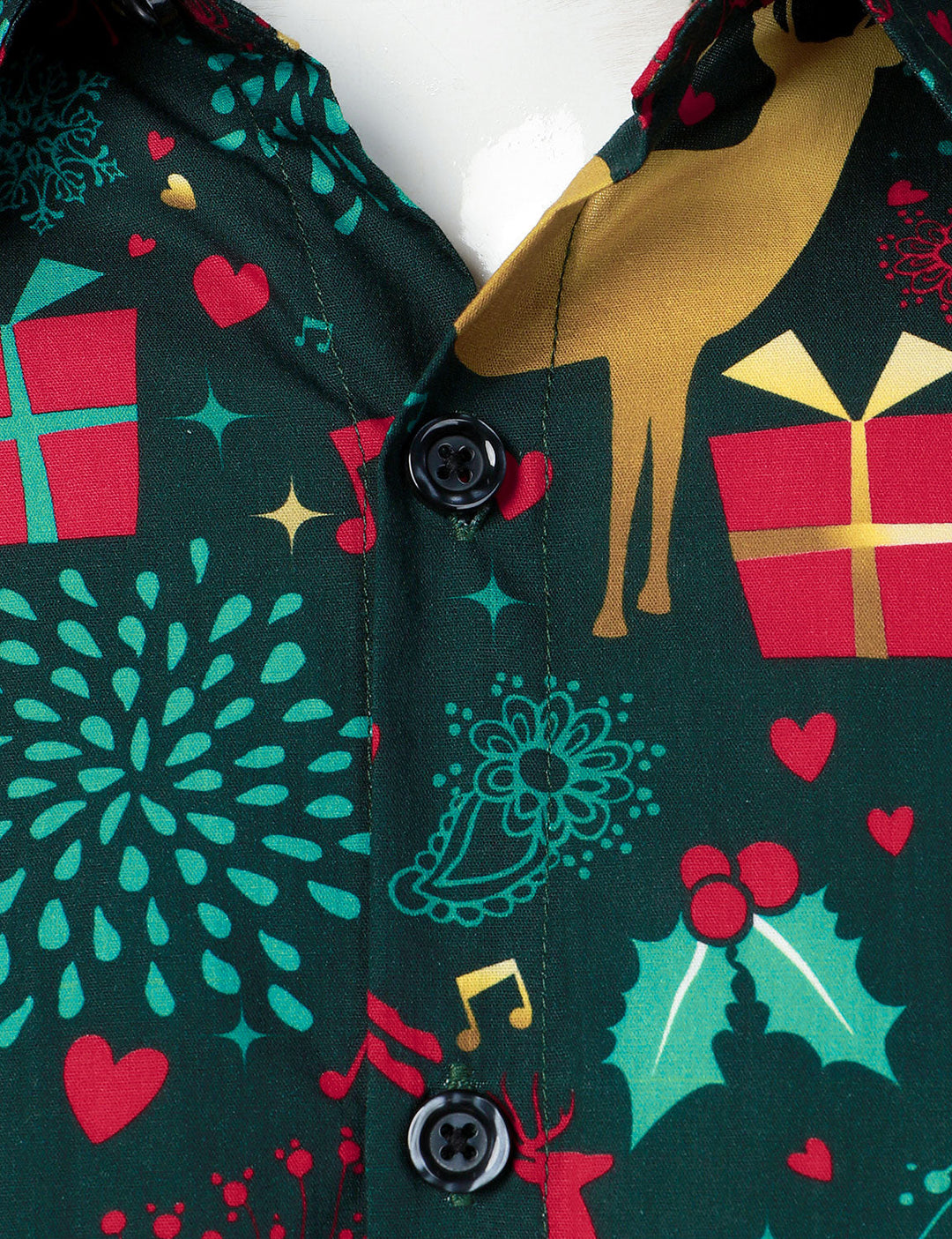 Close-up of the front placket with black buttons, a gold reindeer and red gifts