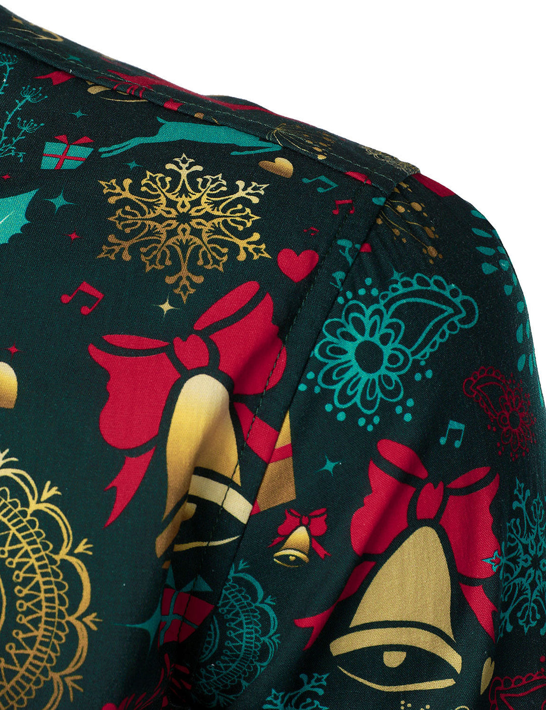 Close-up of the shoulder with red bells and gold snowflakes
