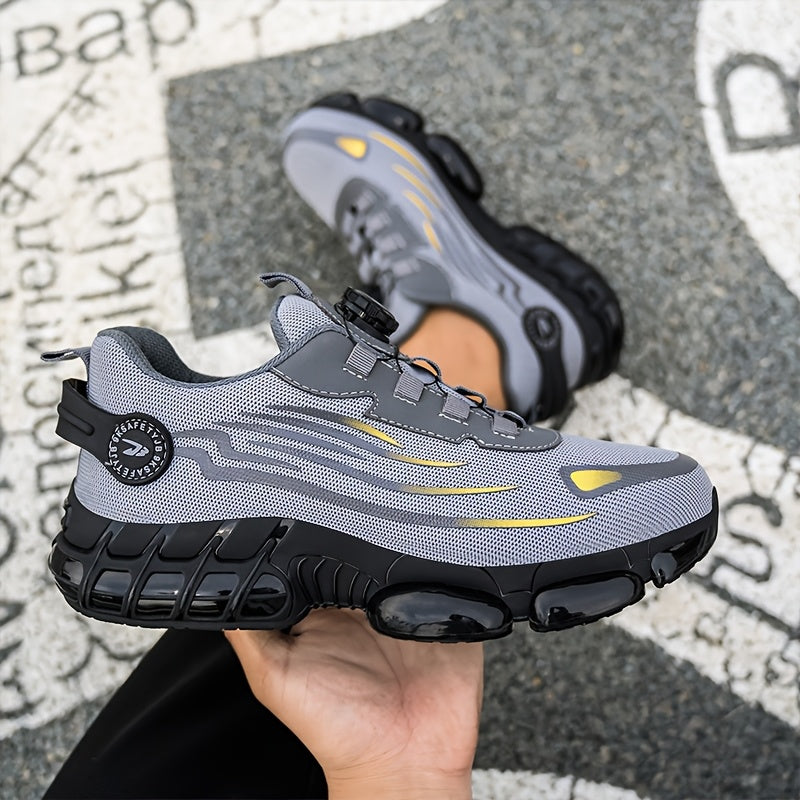 Grey mesh trainer held in a hand showing the thick ridged sole
