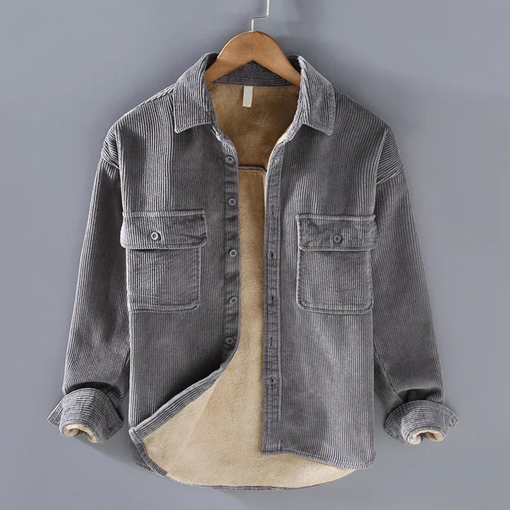 Grey corduroy shirt jacket on a hanger with fleece lining showing