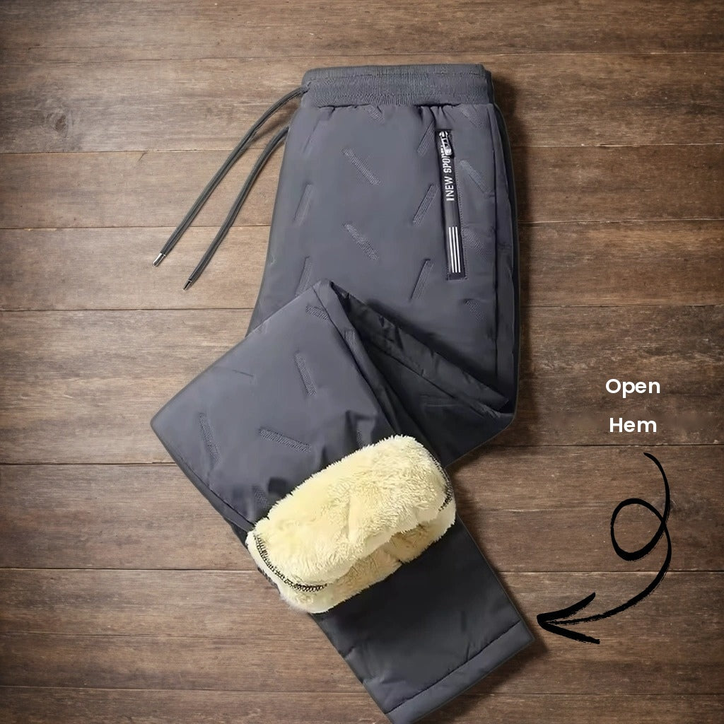 Dark grey trousers with open hem and drawstring waist