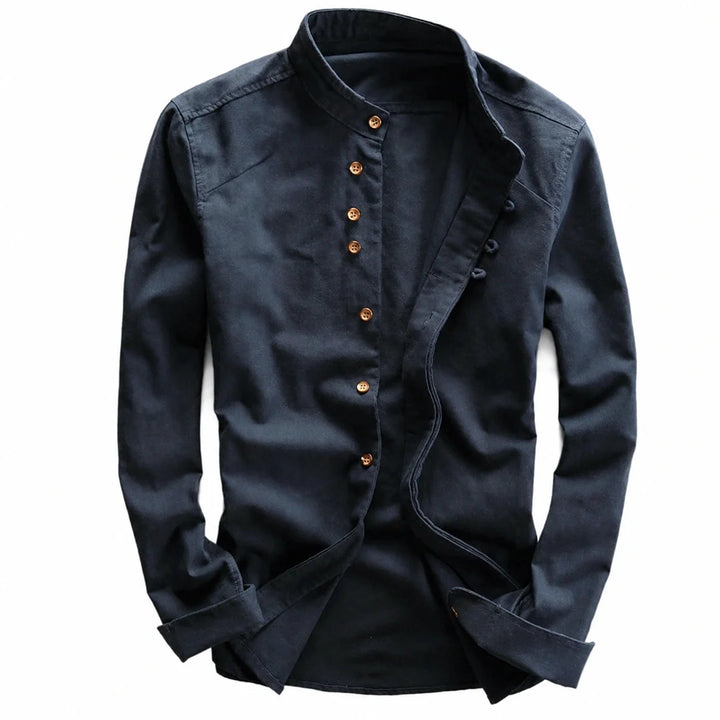 Navy long sleeve shirt laid flat showing the row of brown buttons