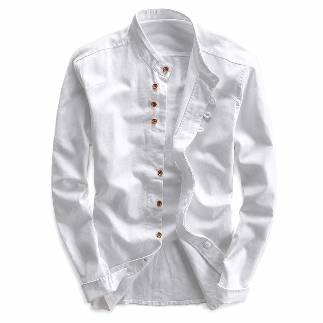 White long sleeve shirt with a stand-up neckline and brown buttons laid flat