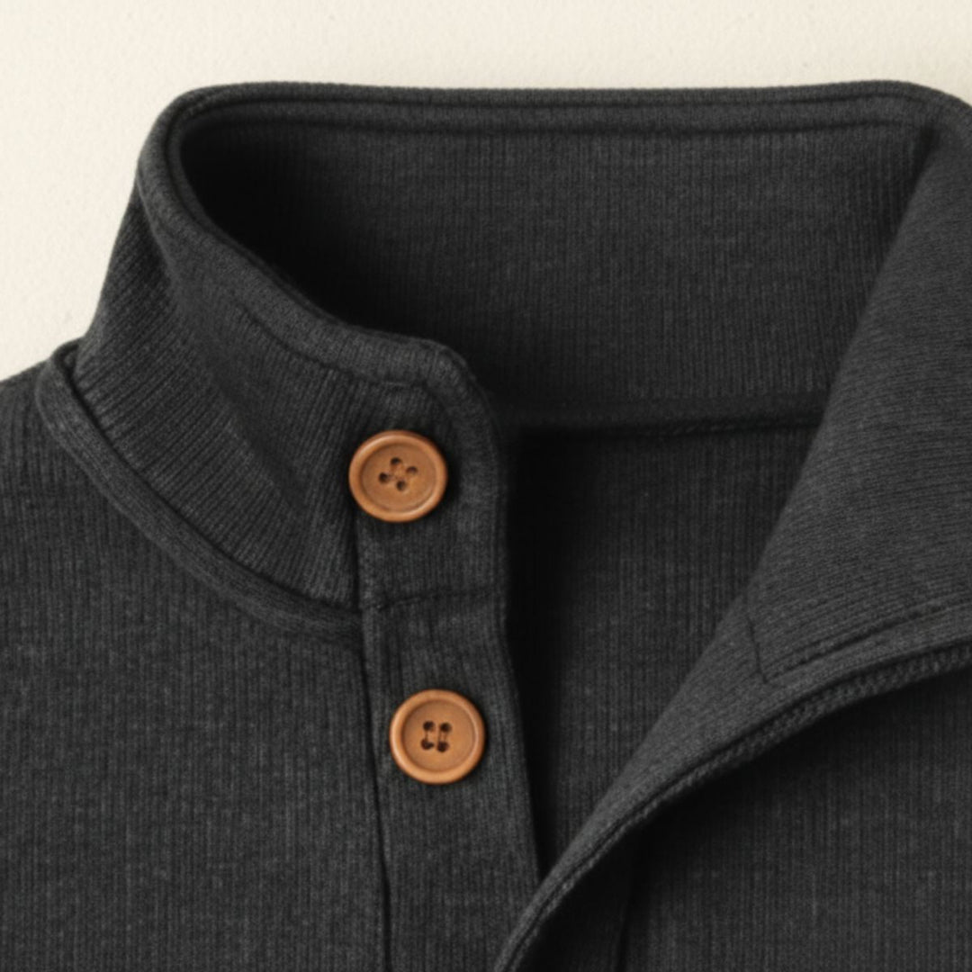 Close view of the raised collar with brown buttons