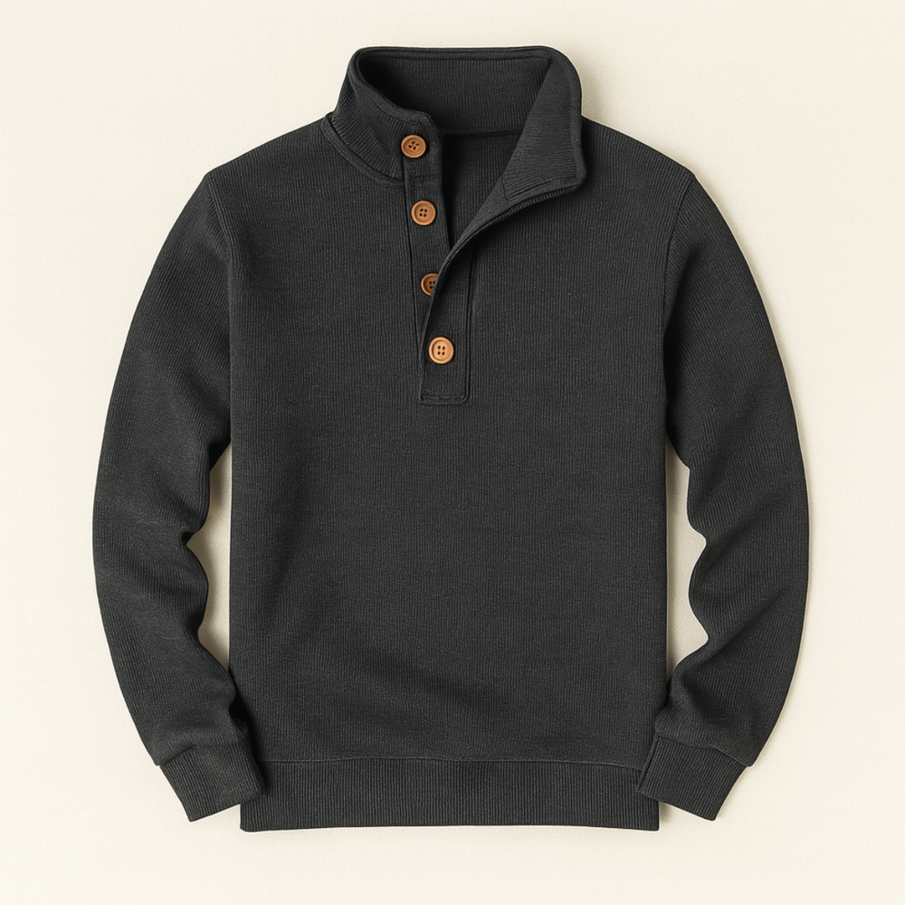 Charcoal grey button neck jumper laid flat on a cream background