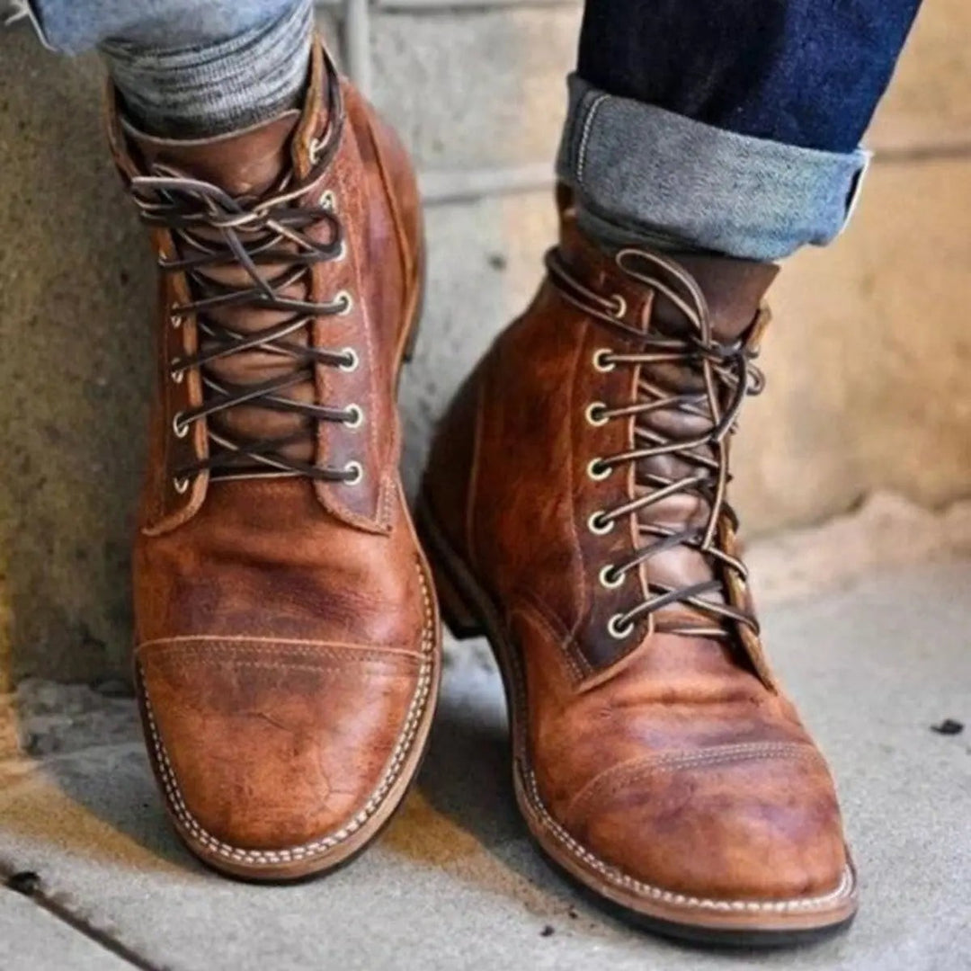 Men's lace up ankle boots in brown, cap toe with welt stitching