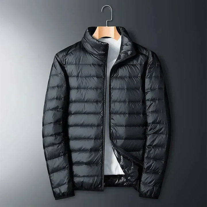 Men's lightweight puffer jacket in black, packable quilted with stand collar and zip