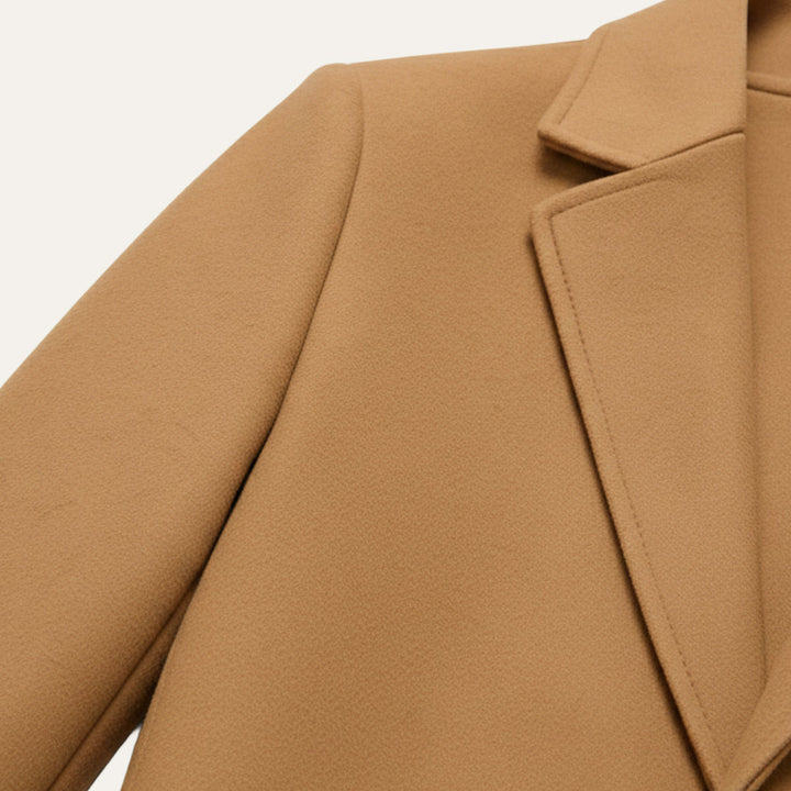 Close up of the camel notch lapel and shoulder seam