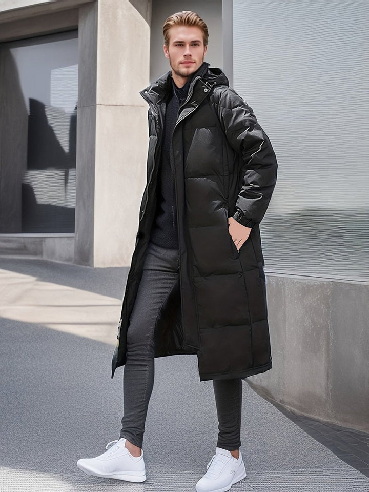 Men's long puffer coat in black, hooded winter coat with snap placket