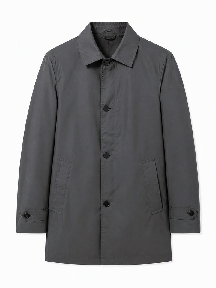 Grey single breasted coat laid flat showing a point collar and buttons