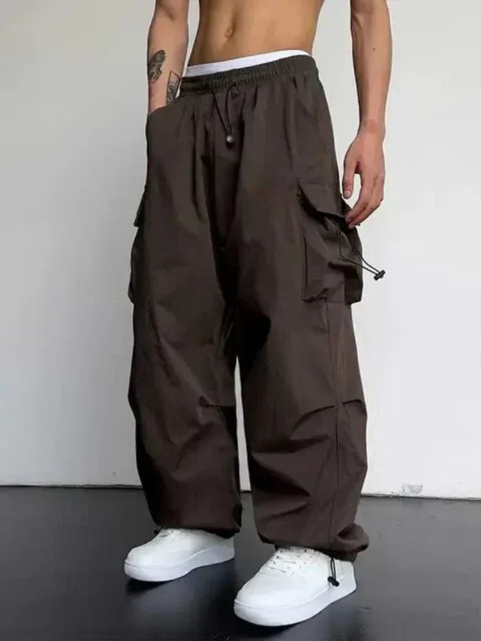 Dark brown wide leg cargo trousers with cord pull pockets
