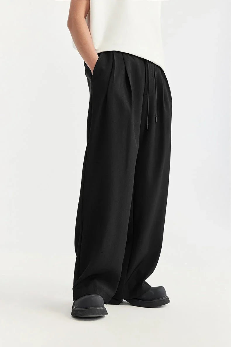 Men's wide leg trousers in black, drawstring pleated relaxed