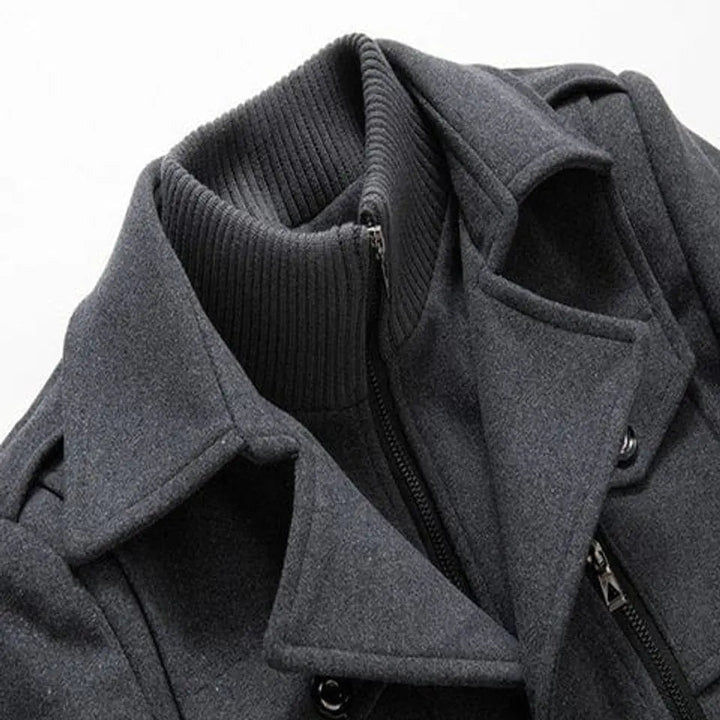 Close view of the ribbed stand collar and zip under the lapel