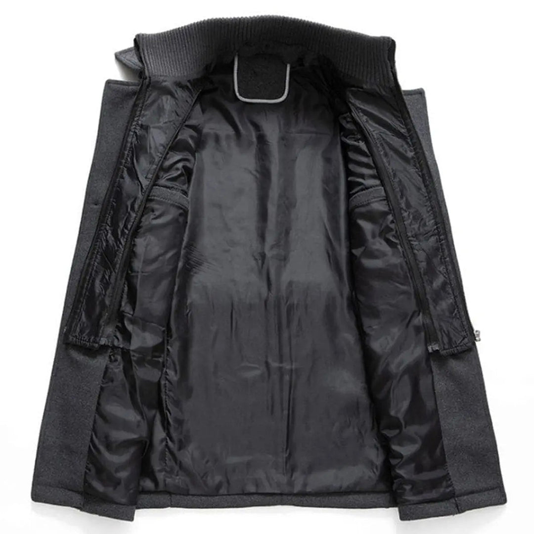 Grey coat laid open to show the quilted inner lining