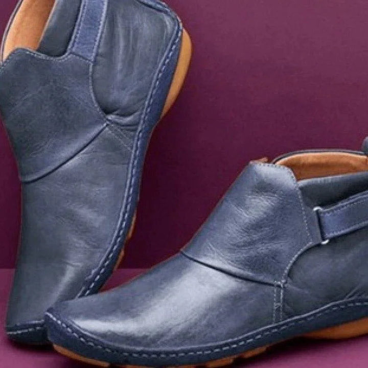 Women's ankle boots in blue, flat strap pull on