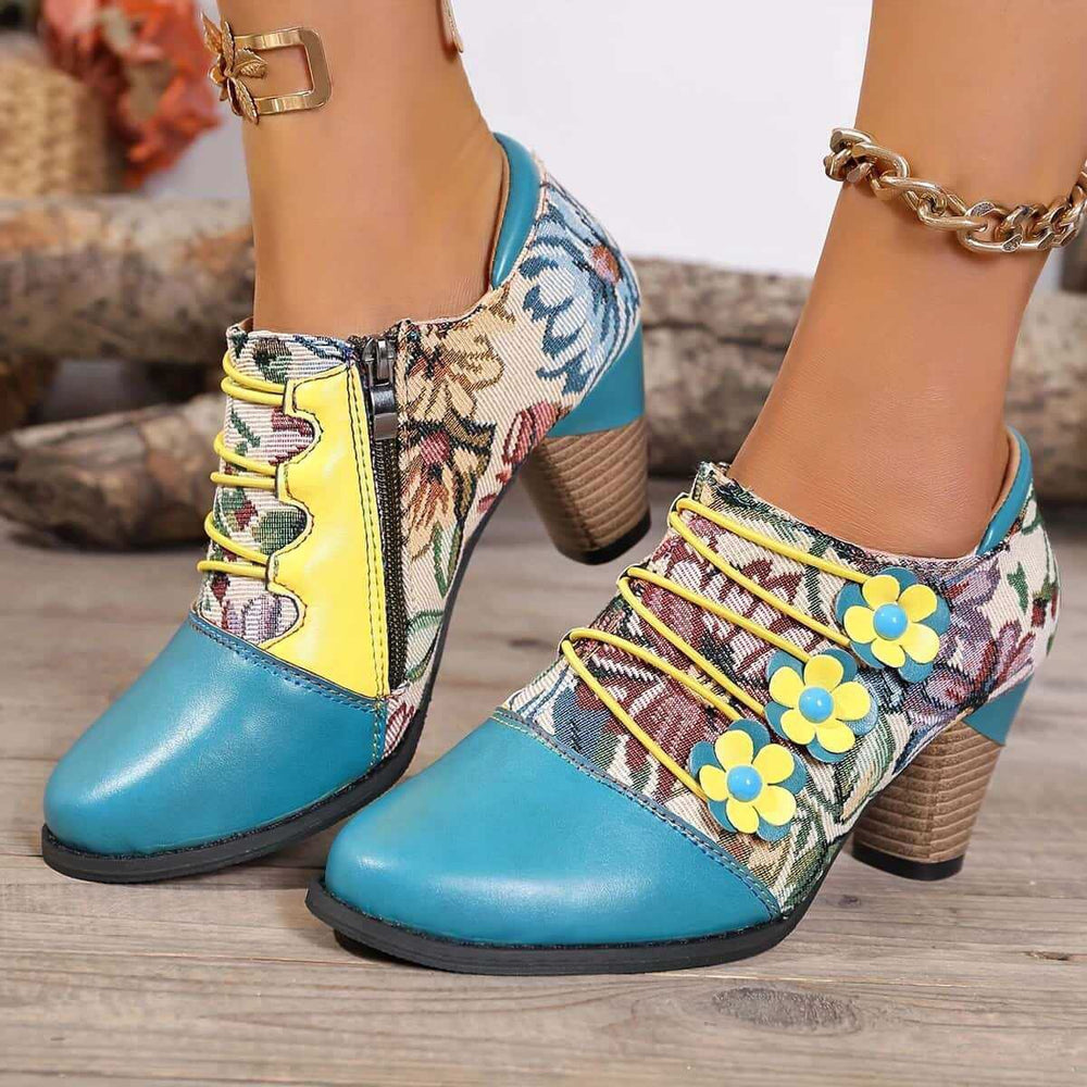 Turquoise ankle boots, worn on foot, front view