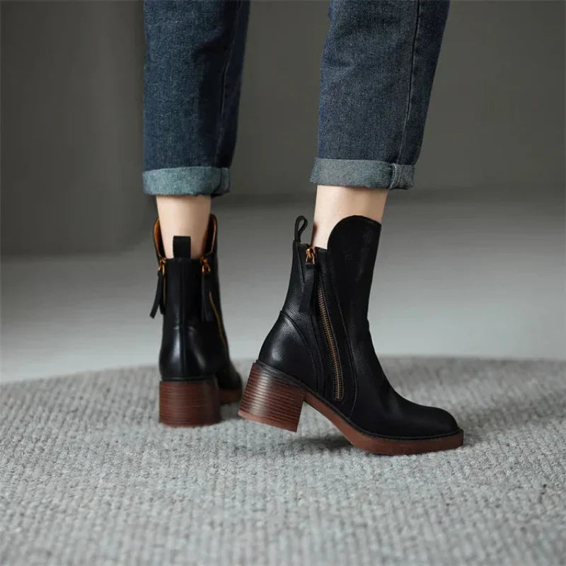 Black boots from behind with back pull loops