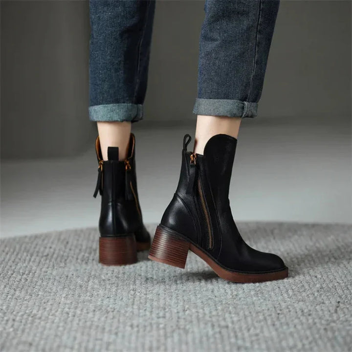 Black boots from behind with back pull loops