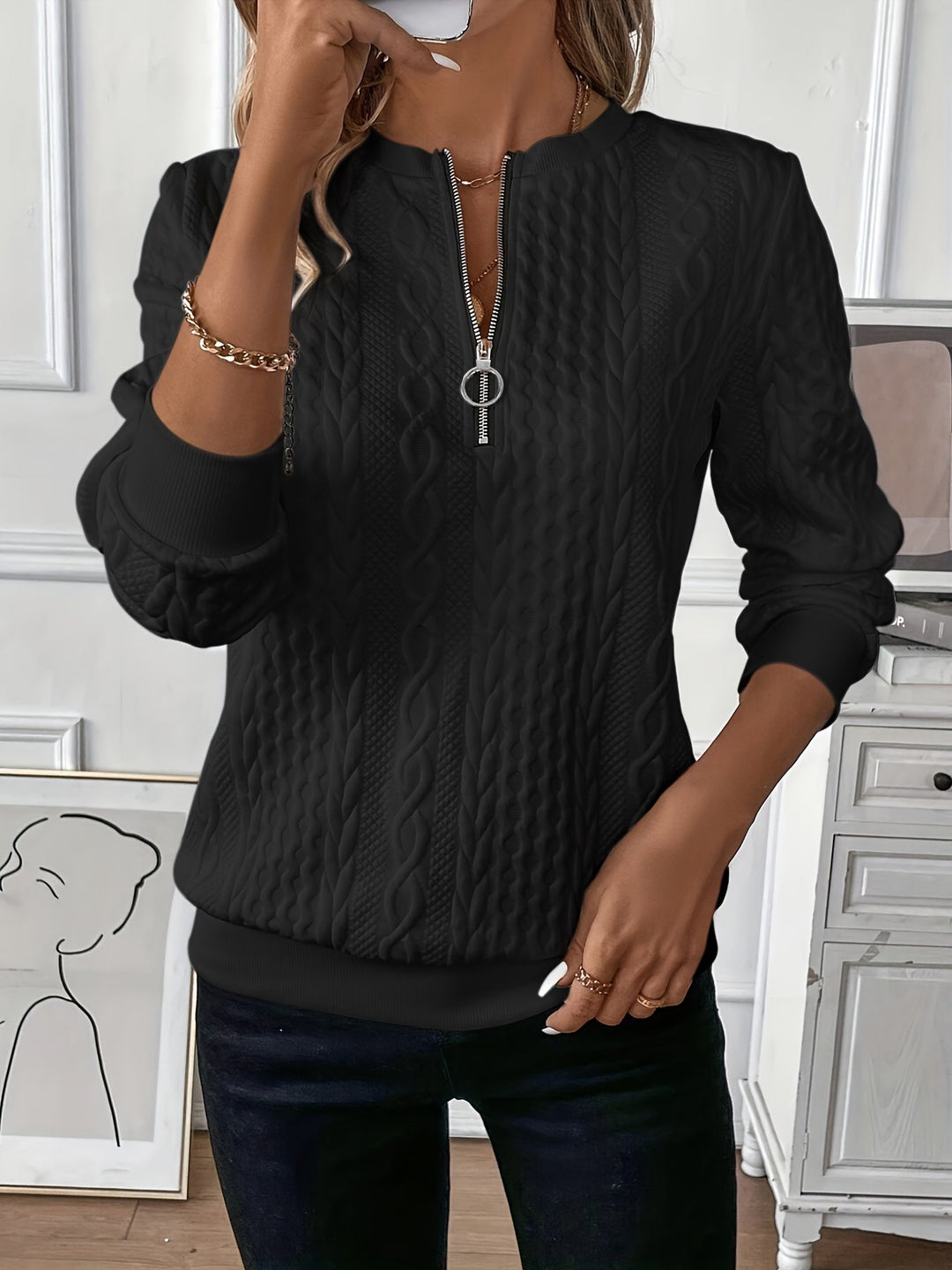 Black cable knit jumper with ring pull half zip, front view