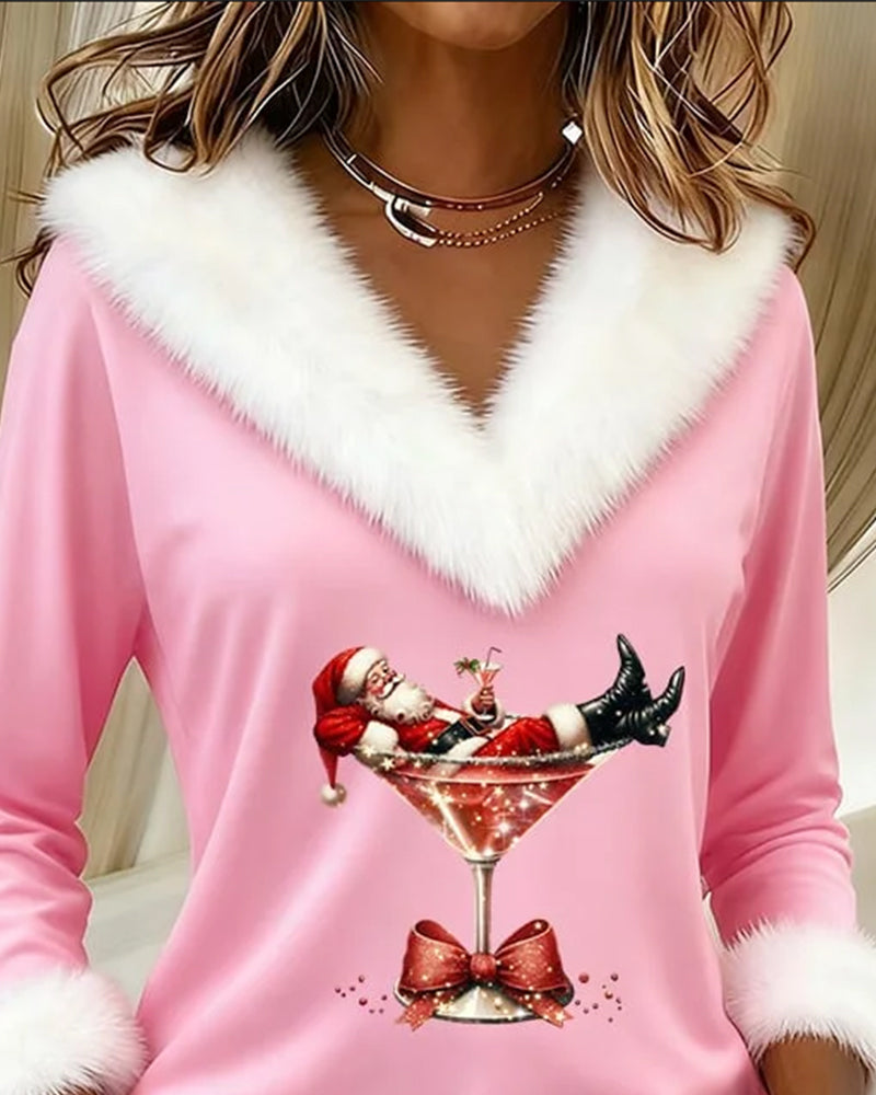 Close view of the pink top with fluffy neckline trim