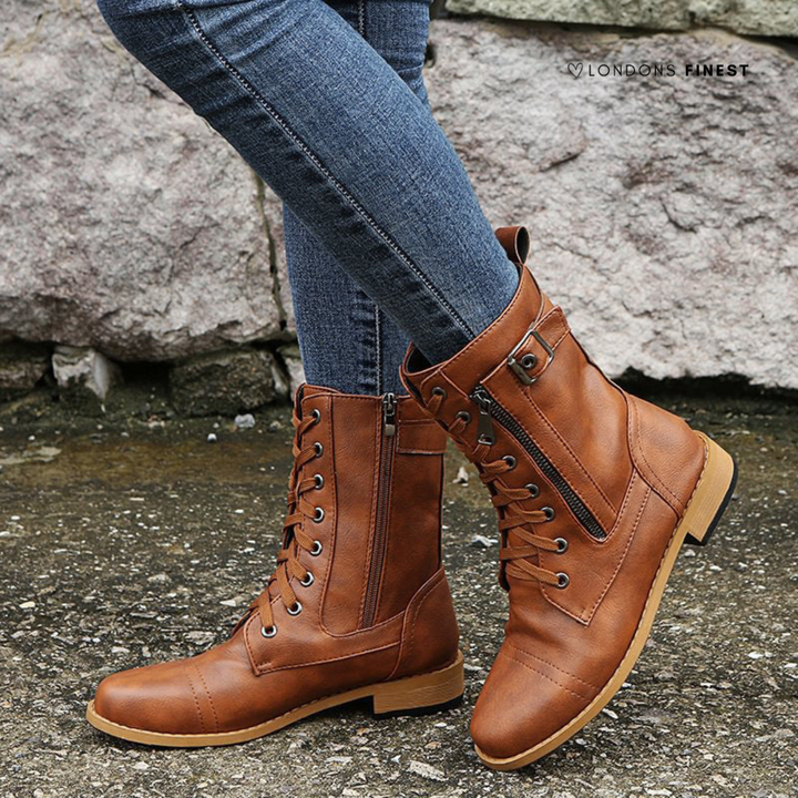 Tan combat boots showing the capped toe and stacked heel