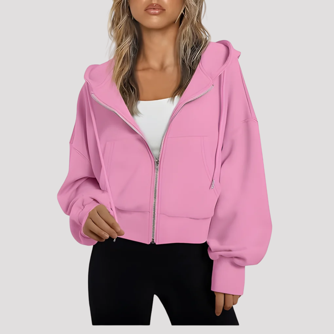 Pink cropped zip up hoodie with drawstring hood, front view