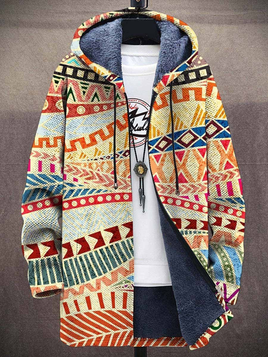 Women's fleece hoodie in cream with aztec pattern bands in rust and teal, worn open