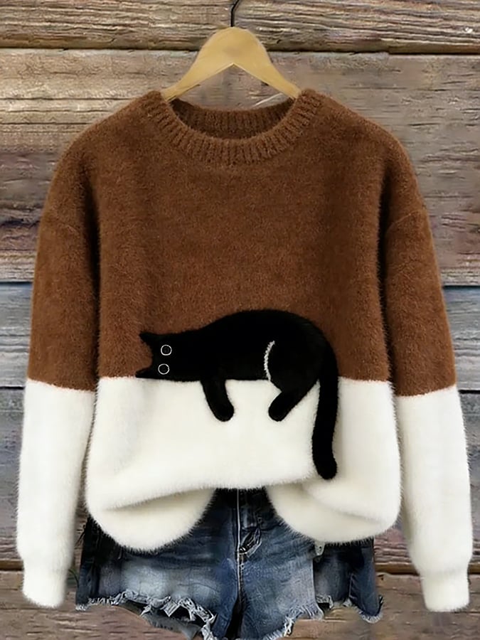 Brown and cream colour block knit with a black cat motif