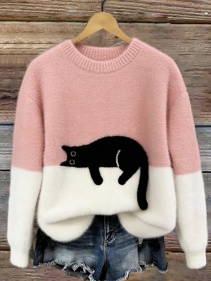 Pink and cream colour block jumper with a sleeping black cat across the front