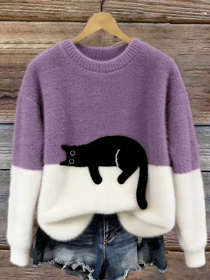 Lilac purple fluffy jumper with a black cat across the colour block line