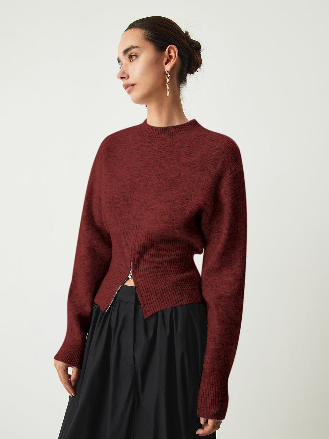 Burgundy fluffy jumper with a curved split front hem