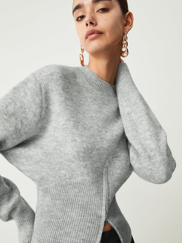 Close view of the crew neck and fluffy knit texture