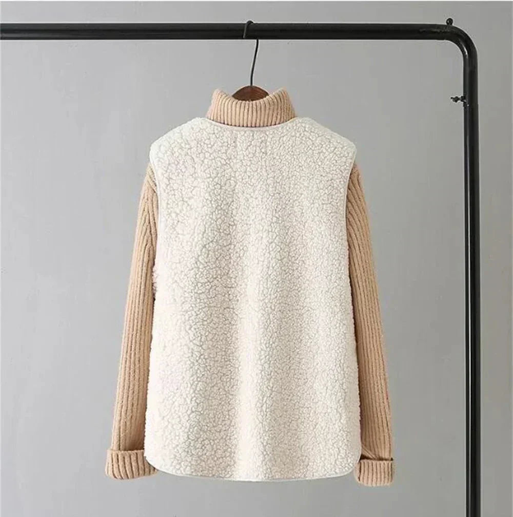 Beige gilet seen from the back on a clothes rail