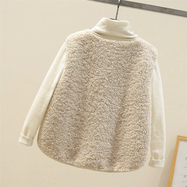 Back view of the beige teddy gilet with a curved hem