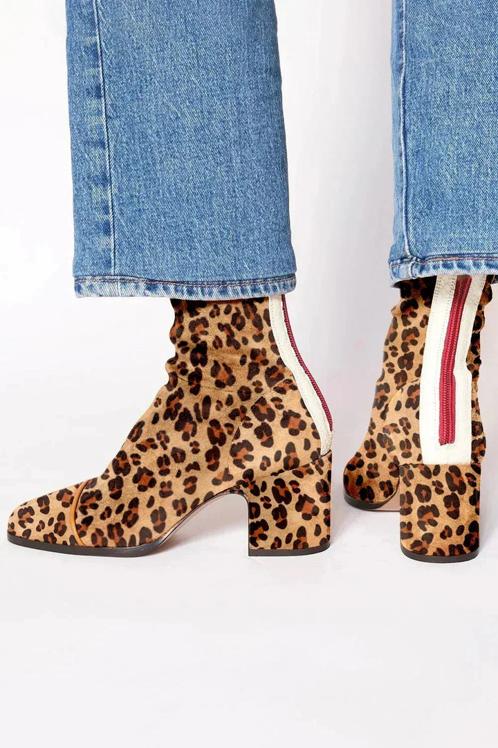 Leopard print ankle boots with a striped tab at the back