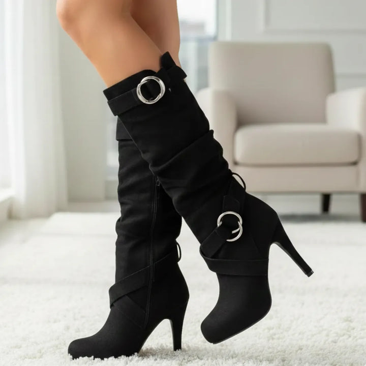 Black slouch knee high boots with two buckle straps
