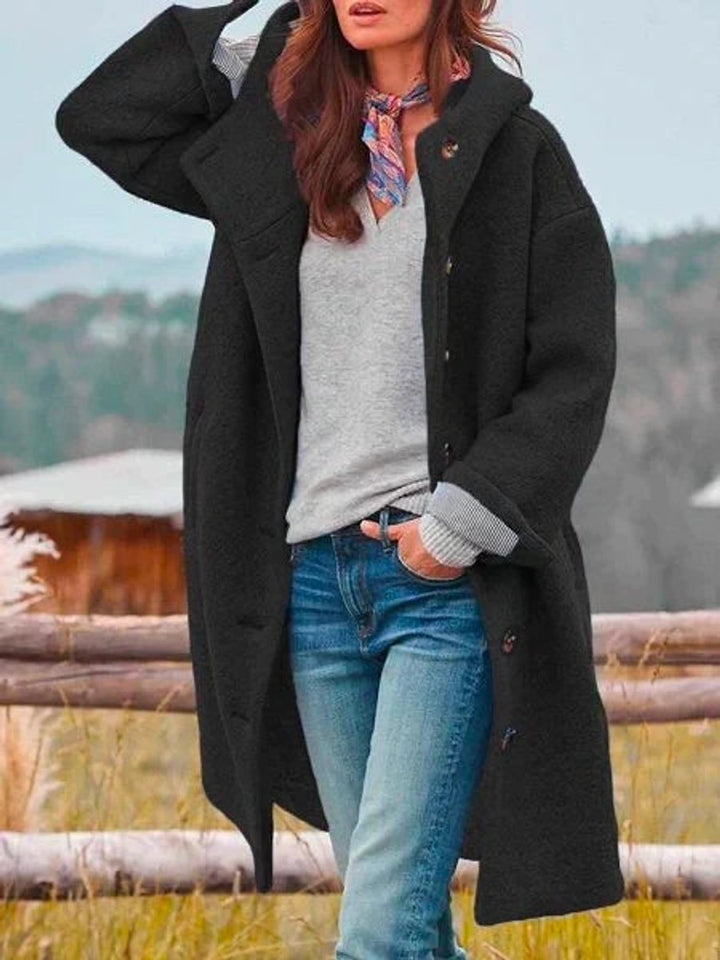 Hooded Coat in black, on model