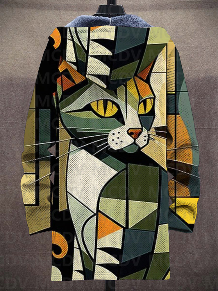Back of the olive jacket showing the full geometric cat face across the hood and body