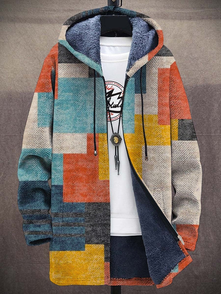 Teal and orange patchwork print jacket with drawcord hood, front view